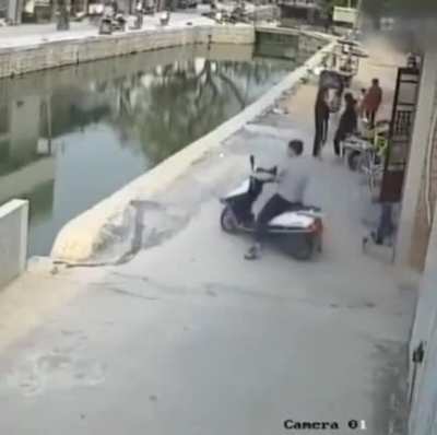The guy didn't even try to save himself or the scooter.