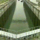 Ships fitting into a canal gate