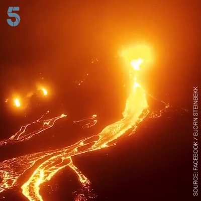 A drone pilot has captured incredible footage of a volcano erupting in Iceland.