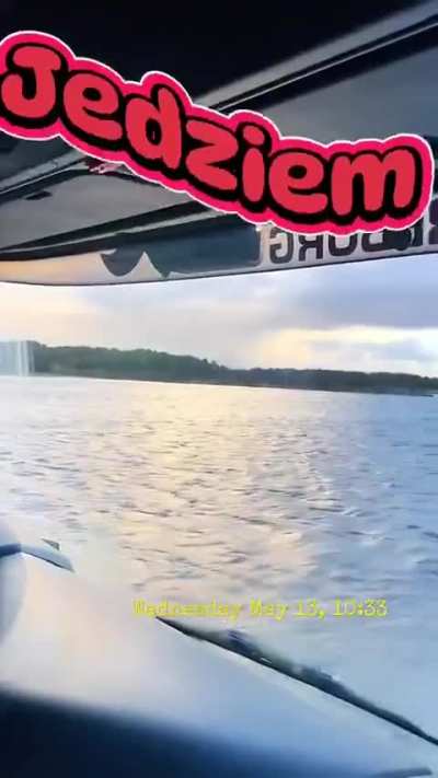 Truck driver crosses flooded road like it’s nothing