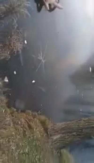 Trying to jump in a frozen lake while being naked