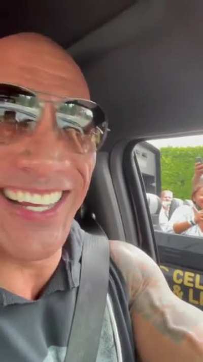 The Rock surprising a tour bus