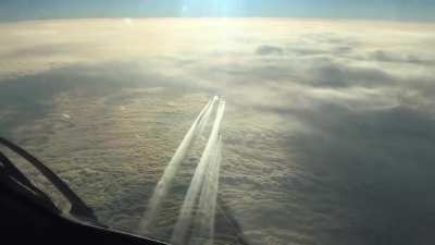 Three passenger planes cruising along the Jet Stream Highway over the Atlantic Ocean