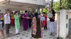 This lady is working in a ICU dept in India, where covid patients are treated. She came home after 20 days of non-stop service. Her family n society people welcomed her.