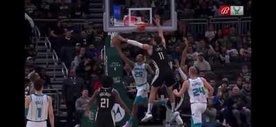 [Highlight] DPOY candidate Brook Lopez attempts to block the shot, misses, but gets the block with his left hand after the forced reverse layup, all in one motion. Before fouling out, Lopez collected 5 blocks
