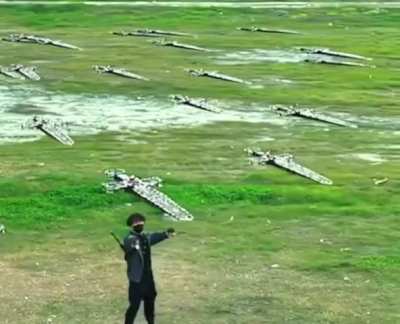This individual makes real-life "Flying swords," using gesture-controlled drones that look straight out of a movie