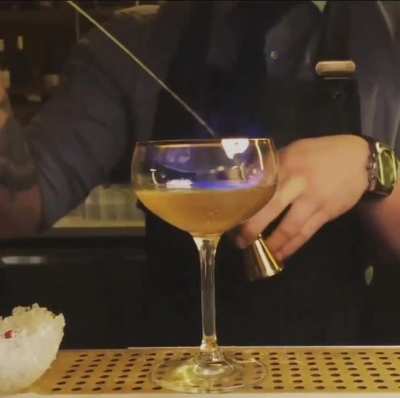 Making the drink "Misty eyes". Looks awesome!