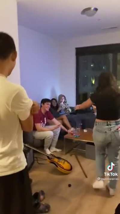 Long Distance girlfriend surprises boyfriend who doesnt seem that excited. People in the comments are sure the boyfriend is cheating.
