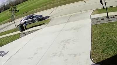 Taking out the trash on a windy day