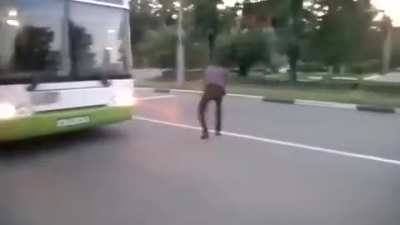 Tries to stop a bus, gets pepper sprayed