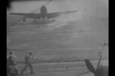 Douglas AD-4 Skyraider of VA-115 loses its engine on landing on USS Philippine Sea after being damaged by flak during a mission over Korea on December 1st 1950
