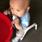 A baby and his frog...