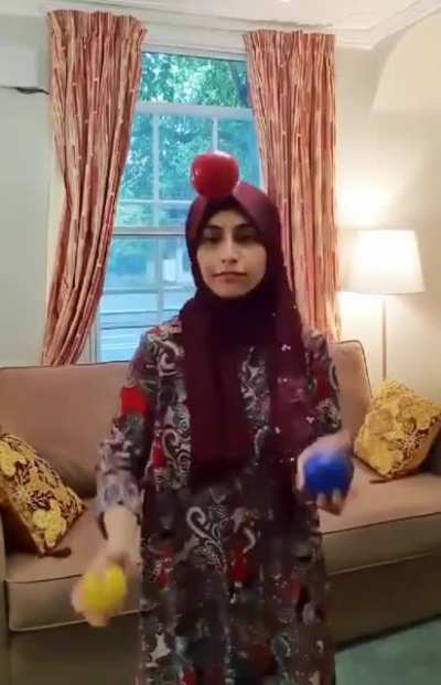 Girl juggling to Irish music. Look how happy she is!