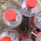 Surrounding a large firecracker in bottles of gasoline