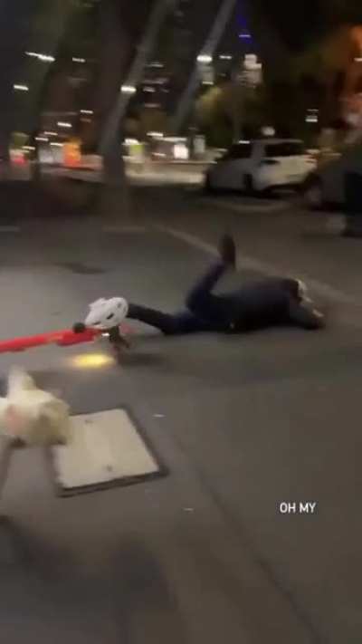 Trying to ride an electric scooter down the stairs.