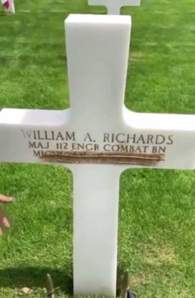 French caretakers take the sand from Omaha Beach and scrub them into the letters to give them the brown/gold coloring.