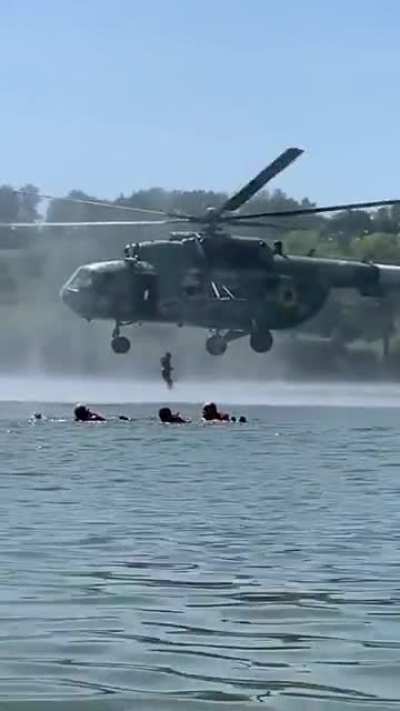 Chilling in a tiny village lake, and then special force deploys there from a helicopter