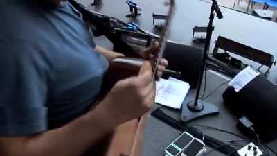 David Gilmour hires street musician to play the wine glasses for a performance of "Shine On You Crazy Diamond"