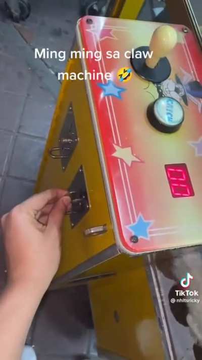 Cat invaded the claw machine as his home. Claw is now considered a pest and mortal enemy.