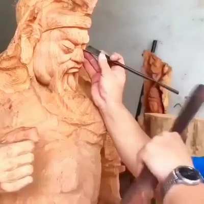 Carving a warrior out of wood