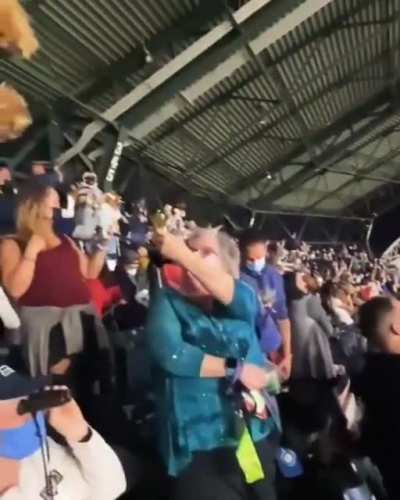 Fans at the Mariners' game brought their dogs to the ball park to hold up their dog for the chance to be featured on the Simbacam