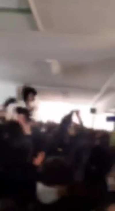 IRAN: Highschool girls take over their school and chant "death to the dictator"