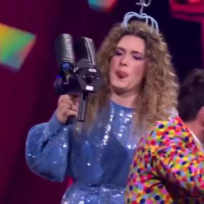 Belgium presentor fumbles with flamethrower on live televisionshow for kids.