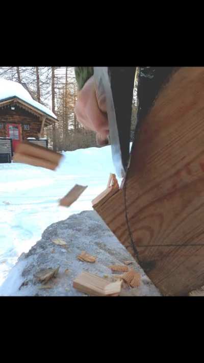 Me testing out an old Finnish axe I just restored. Cutting a curve on some 3/4" pine board.