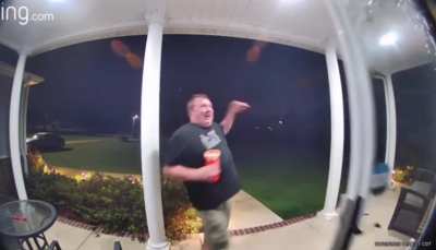 Ring catches snake hanging out on screen door as home owner tries to get in the house