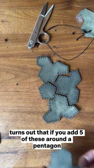 Crafting a football from the newly discovered "Einstein" tile (the first single shape that can fill the infinite plane in a pattern that never repeats) and pentagons.