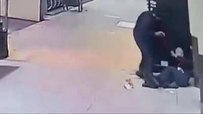 a man offering his coat to a homeless person in freezing temperature