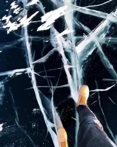 ? Crystal clear ice of the frozen Baikal Lake ?