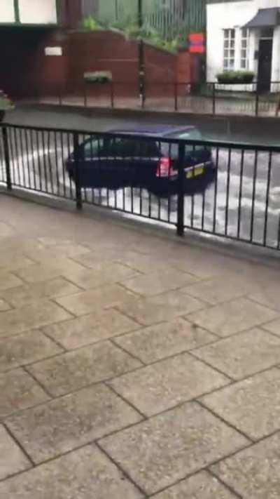 Trying to cross the flooded street
