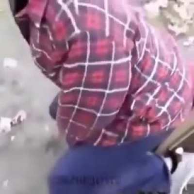 WCGW swinging on a playground toy