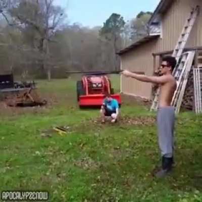 Holding a shotgun like a pistol
