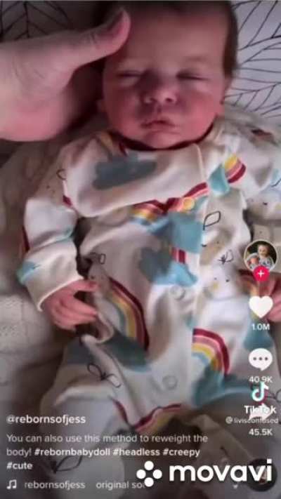 Why is she holding the baby like that wtf??