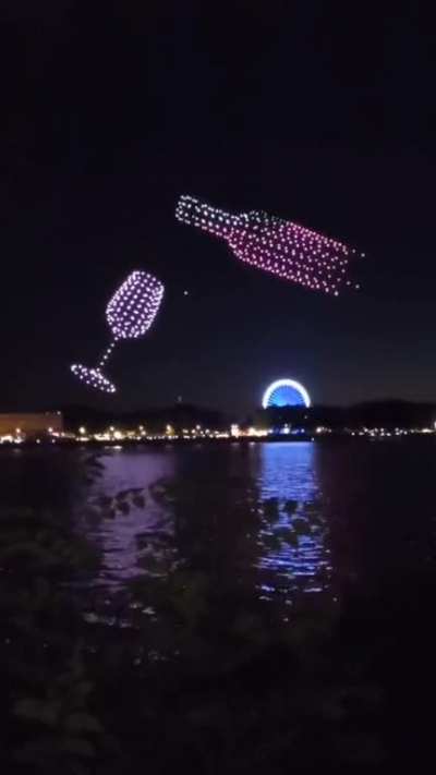 Drones used in the Wine Festival celebrations illuminated the night. France, Bordeaux
