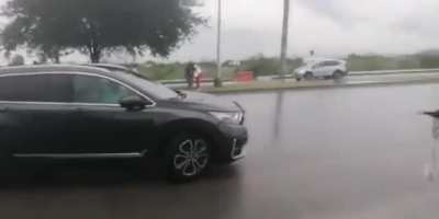 WCGW Trying to block traffic by walking on the highway.