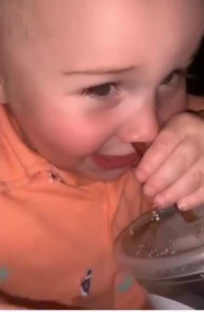 Curious baby sipped thru his nose