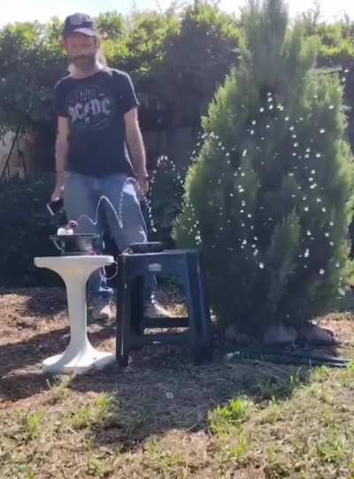 Attaching a water hose sprinkler to a speaker