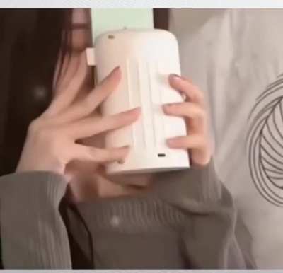 Remote kissing device recently invented by a Chinese university student. The device is designed specifically for long-distance relationships and can mimic and transfer the kiss of a person to the "mouth on the other side"