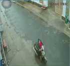 Woman petting a cow is kicked then hit by a motorcycle