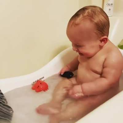 My son, THOROUGHLY enjoying his evening bath...?