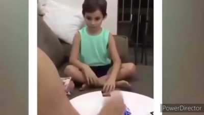 Father and son play some UNO.