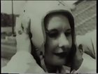 Demonstrating the newly-invented football helmet