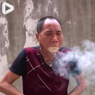 Man creates fire using just his mouth