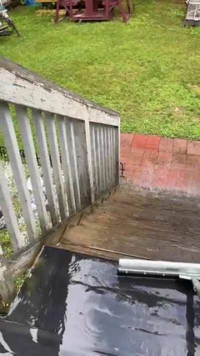 Just rained, swabbing my grandma’s deck