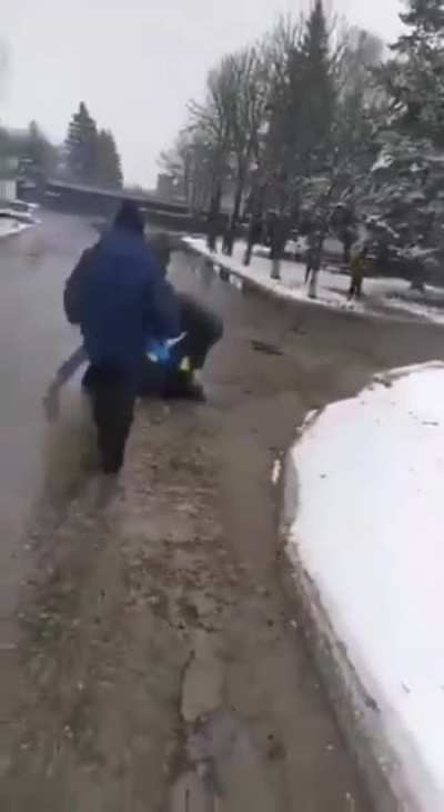Unarmed Ukraine citizen is shot, a group of people come to his side "You'll have to shoot us all" Unreal bravery