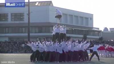 Bo-taoshi is a Japanese "capture the flag" game where 2 teams of 75 a side try to move the opposition's pole lower than 30° to the horizontal. Punching, kicking, strangling, pulling heads, are all permitted.