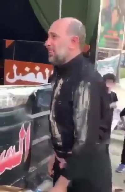 This Iranian guy is "punishing cold water" because his religious Imam was very thirsty when he died in a war (about 1400 years ago) and "cold water" wasn't there to quench his thirst